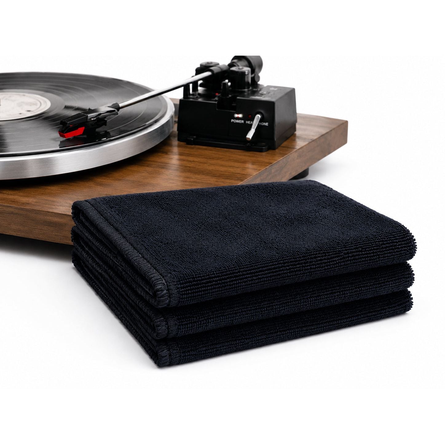GrooveWasher black microfiber towel being used on a turntable